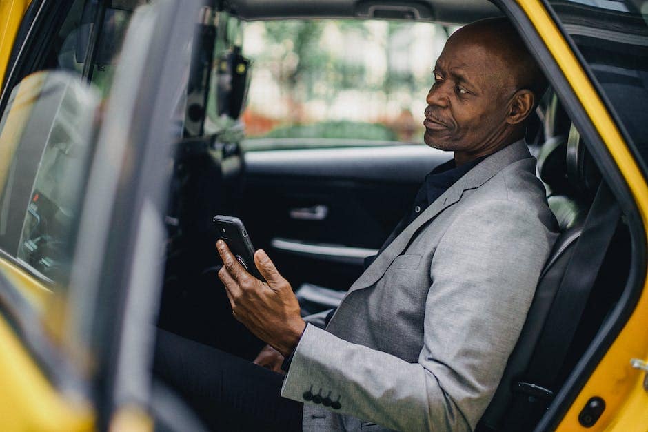 A person using a smartphone to book an online cab.